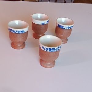 Adorable blue and white pottery with wooden base  1970s set of four egg cups
